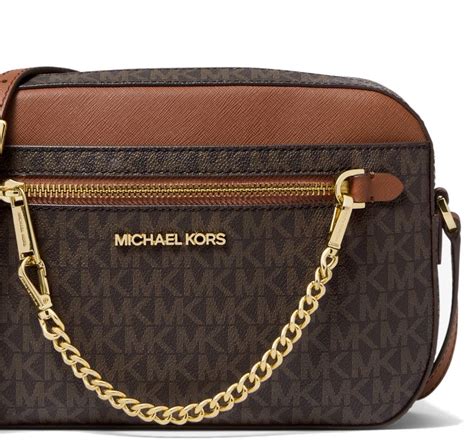 michael kors outlet jet set large logo crossbody bag|michael kors bag with airplanes.